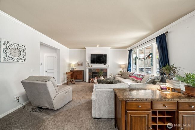 From standing in the kitchen it's a nice view of the family room where everyone seems to gather. | Image 6