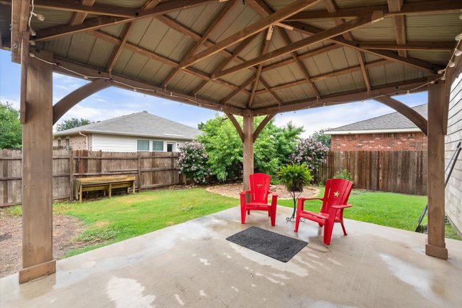Fenced backyard featuring a patio area and a gazebo | Image 28