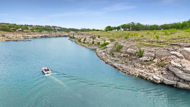 Endless opportunities for waterfront recreation abound—boating, swimming, paddleboarding, jet skiing, wake surfing—all just steps from your shoreline. | Image 4