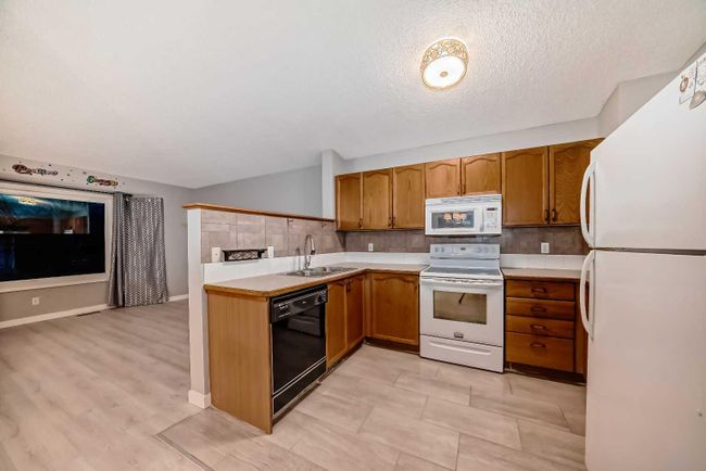 97 Martinvalley Crescent Ne, Home with 4 bedrooms, 2 bathrooms and 2 parking in Calgary AB | Image 13