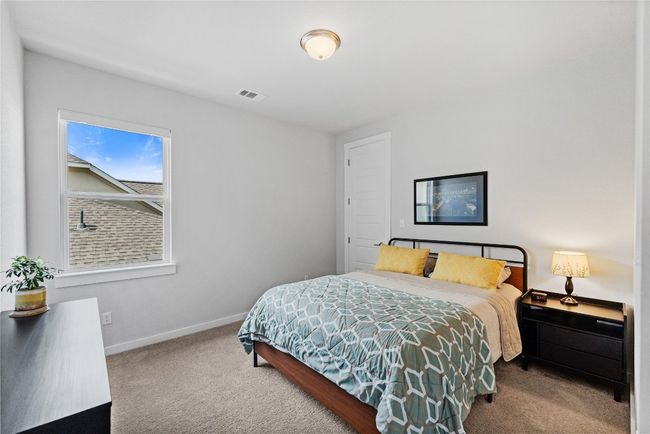 Bedroom featuring baseboards, visible vents, and carpet | Image 20