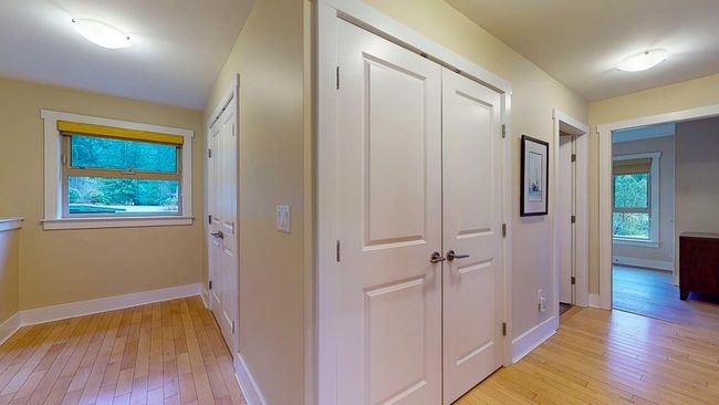 Hall featuring baseboards and light wood-style floors | Image 30