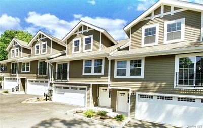 View of front of home with a garage | Image 1