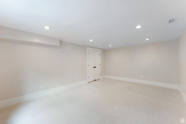 Bedroom 7with recessed lighting and light carpet | Image 35