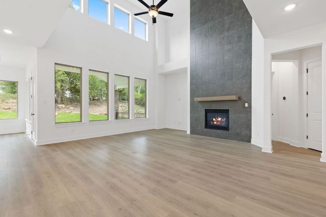 Family Room with soaring ceiling & fireplace | Image 16