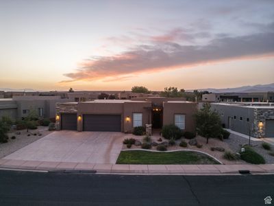 View of front of property with a garage | Image 1