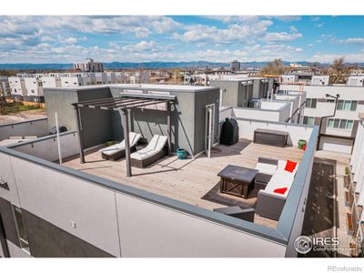 The expansive wrap around rooftop deck allows you to capture sweeping views of the iconic Rocky Mountain landscape. | Image 2