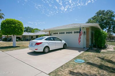 10725 W Mission Lane, Home with 3 bedrooms, 2 bathrooms and null parking in Sun City AZ | Image 3