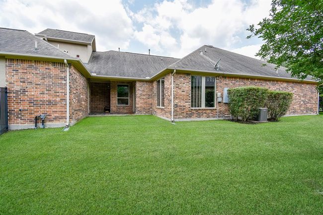The view of the side yard can be enjoyed from the windows in the study! | Image 46