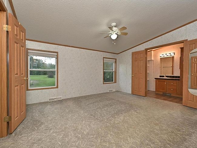 Primary bedroom and bathroom | Image 11