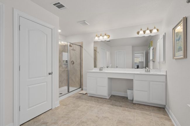 Full bath with double vanity and a stall shower | Image 20