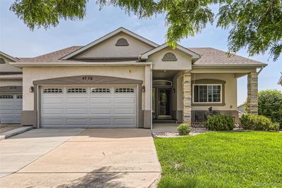 4776 Glen Isle Drive, Townhouse with 4 bedrooms, 1 bathrooms and 2 parking in Loveland CO | Image 1