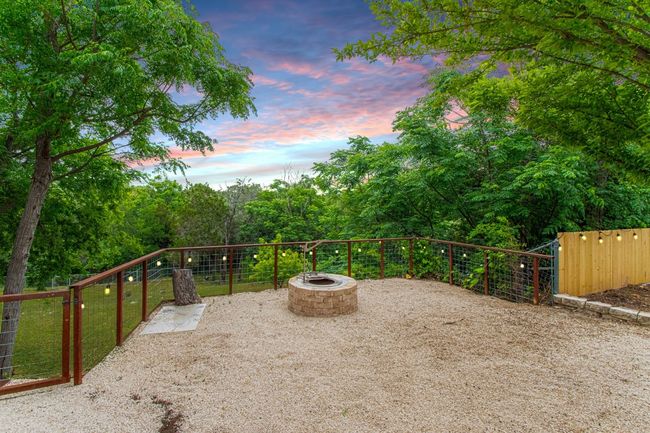 Continue entertaining outside with your Zentro Stainless Steel Smokeless Fire Pit Insert that is inside this Fire pit. | Image 12