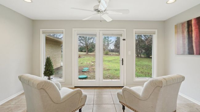 Entryway with baseboards, a wealth of natural light, and light tile patterned floors | Image 26