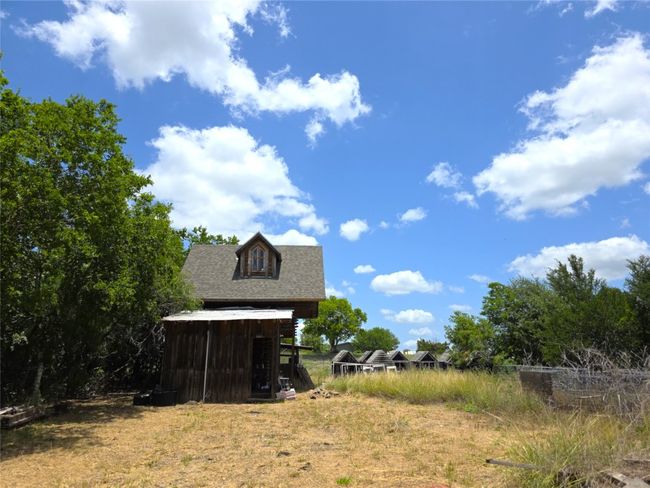 View of yard featuring an outbuilding | Image 27