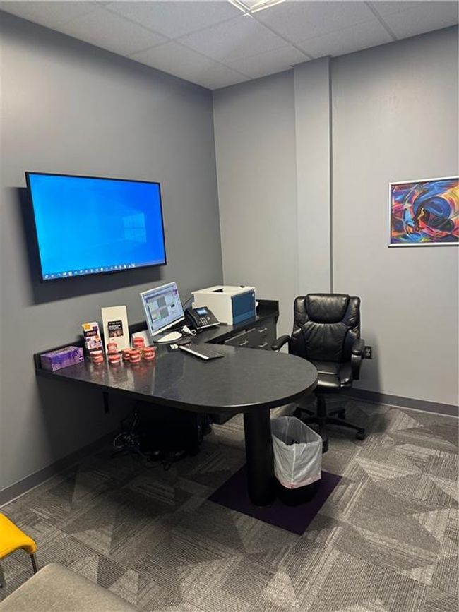 Office space featuring a paneled ceiling and carpet | Image 29
