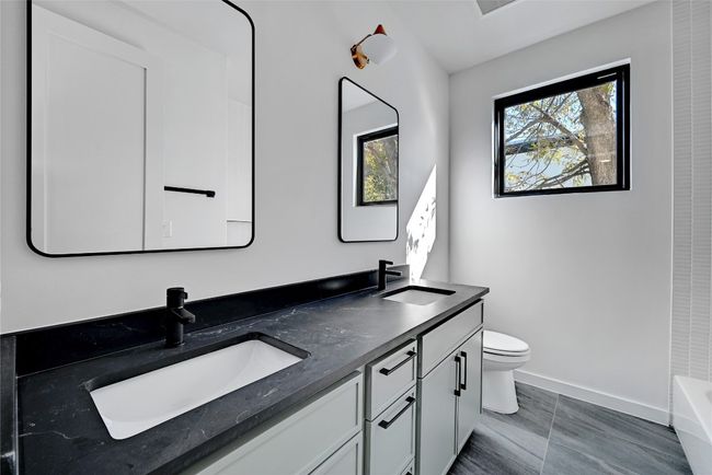 Bathroom with toilet and vanity | Image 13