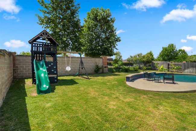 Large yard still has tons of space for corn hole even after a full playset! | Image 32