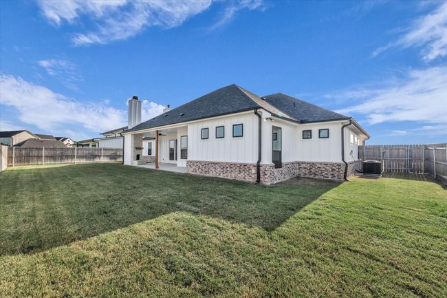 Back yard has a privacy fence | Image 34
