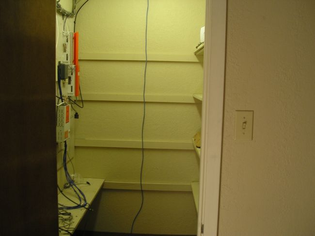 Unfurnished office with a drop ceiling and baseboards | Image 14