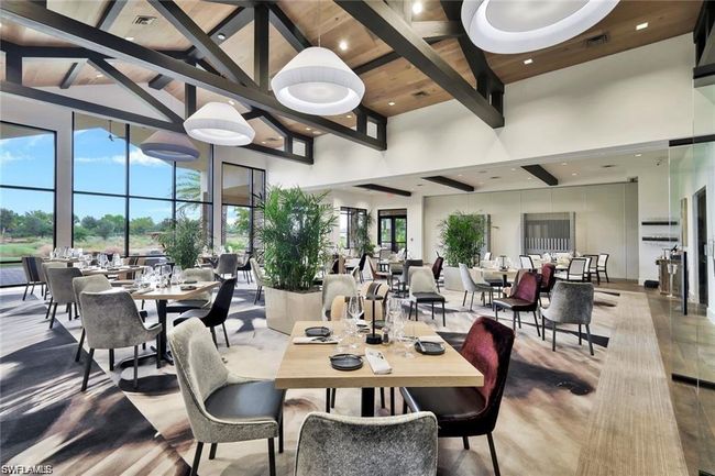 Dining area featuring visible vents, wooden ceiling, high vaulted ceiling, and beamed ceiling | Image 30