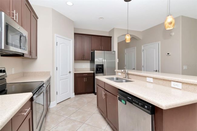 7703 S Fitzgerald St, House other with 4 bedrooms, 3 bathrooms and null parking in Tampa FL | Image 12
