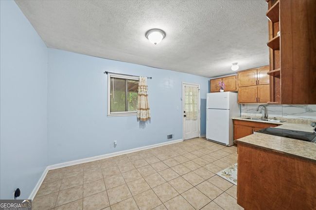 6516 Maddox Rd, House other with 3 bedrooms, 2 bathrooms and null parking in Morrow GA | Image 6