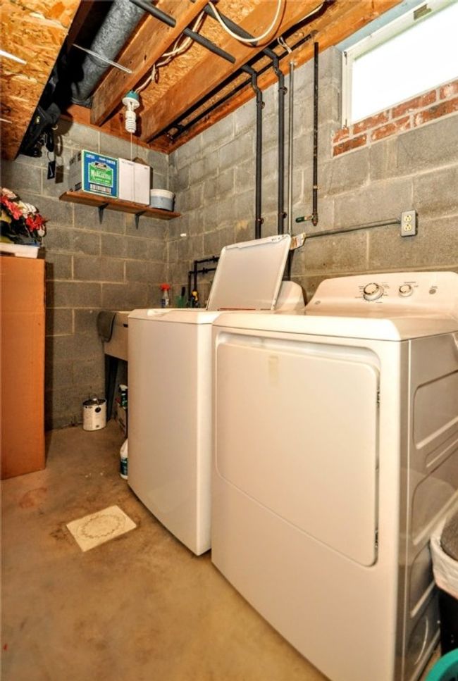 The laundry room on the lower level | Image 40