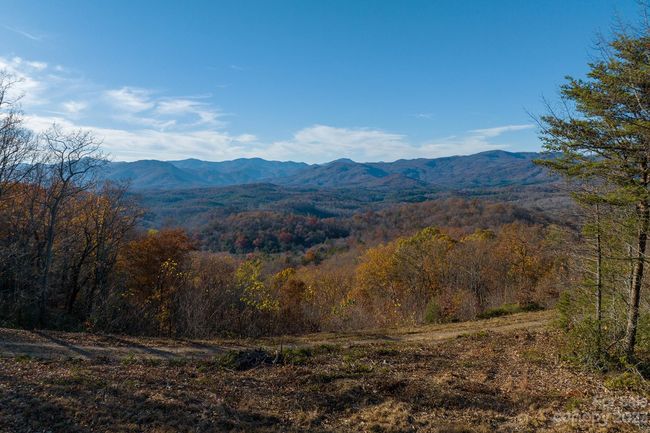 This is the lot above/diagonally that sees the "same views", almost. It is also available for purchase (by the same seller, see the other MLS listing- all lots available can be purchased at a discount price) | Image 15