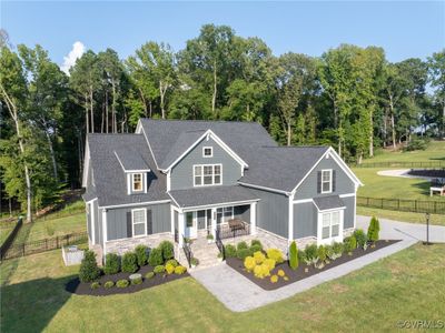 Craftsman-style home featuring a front yard | Image 2