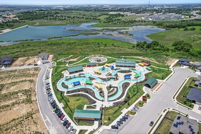 Aerial view of property and surrounding area featuring a nearby body of water | Image 39