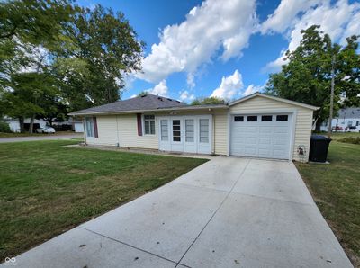 New garage door, new opener and new concrete drive | Image 3