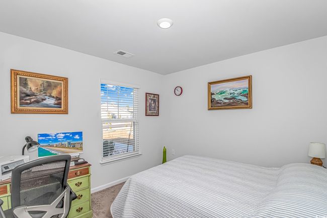 Bedroom featuring carpet floors | Image 13
