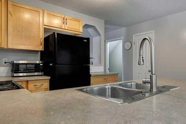 95 - 105 Drake Landing Common, Home with 4 bedrooms, 2 bathrooms and 2 parking in Okotoks AB | Image 10