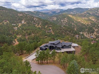 1.53 acres with decks and patios on all sides | Image 2