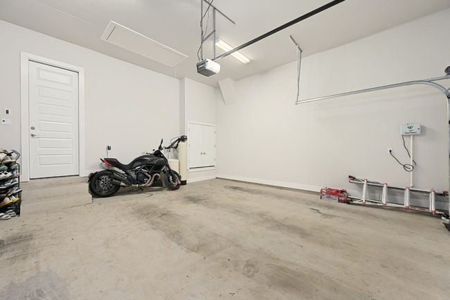 This home boasts a spacious 3-car garage, providing ample parking and storage space. | Image 31