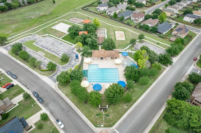 Aerial perspective of suburban area with a pool | Image 40