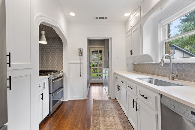 Galley kitchen with breakfast nook and updated SS appliances | Image 8