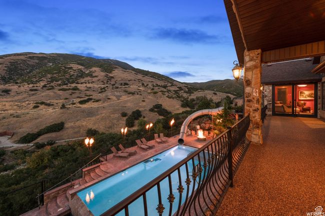 Exterior space with a mountain view and a patio area | Image 6