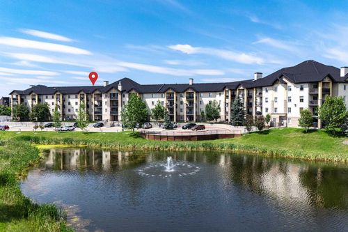 8213-304 Mackenzie Way Sw, Airdrie, AB, T4B3H8 | Card Image