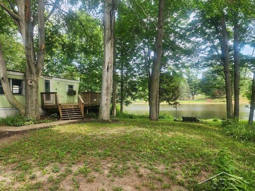 7946 Manitonka Lane, Unknown, MI, 48632 | Card Image