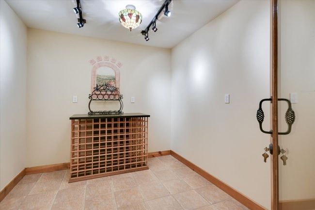 A true Wine Cellar, as it is below ground and has a dehumidifier! Yes, those are keys! | Image 11