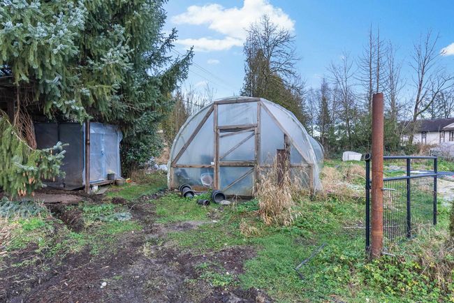 View of greenhouse featuring fence | Image 38