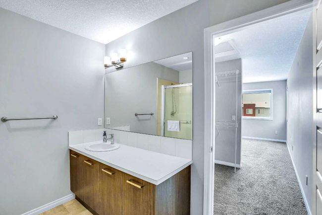 201 - 70 Saddlestone Dr Ne, Townhouse with 2 bedrooms, 3 bathrooms and 1 parking in Calgary AB | Image 15