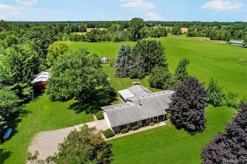 595 N Cedar Rd, Fowlerville, MI, 48836-9242 | Card Image