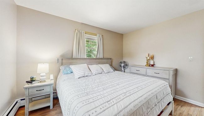 Bedroom featuring Very nice Bedroom with Beautfiful light stained Hardwood Flooring. | Image 16