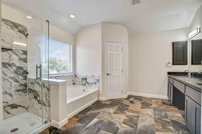 Dual vanities, separate shower and soaking tub | Image 9