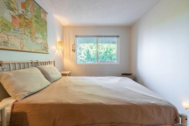 Bedroom featuring a textured ceiling | Image 4