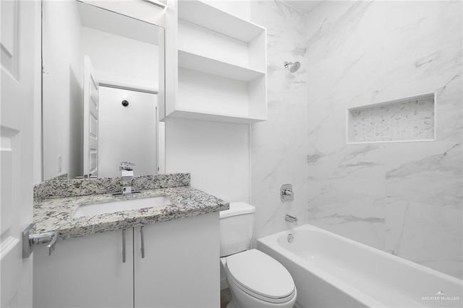 Bathroom with vanity and shower / bathtub combination | Image 7