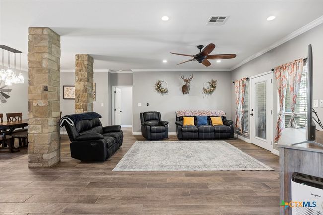 Open Living Area with Beautiful Columns | Image 6